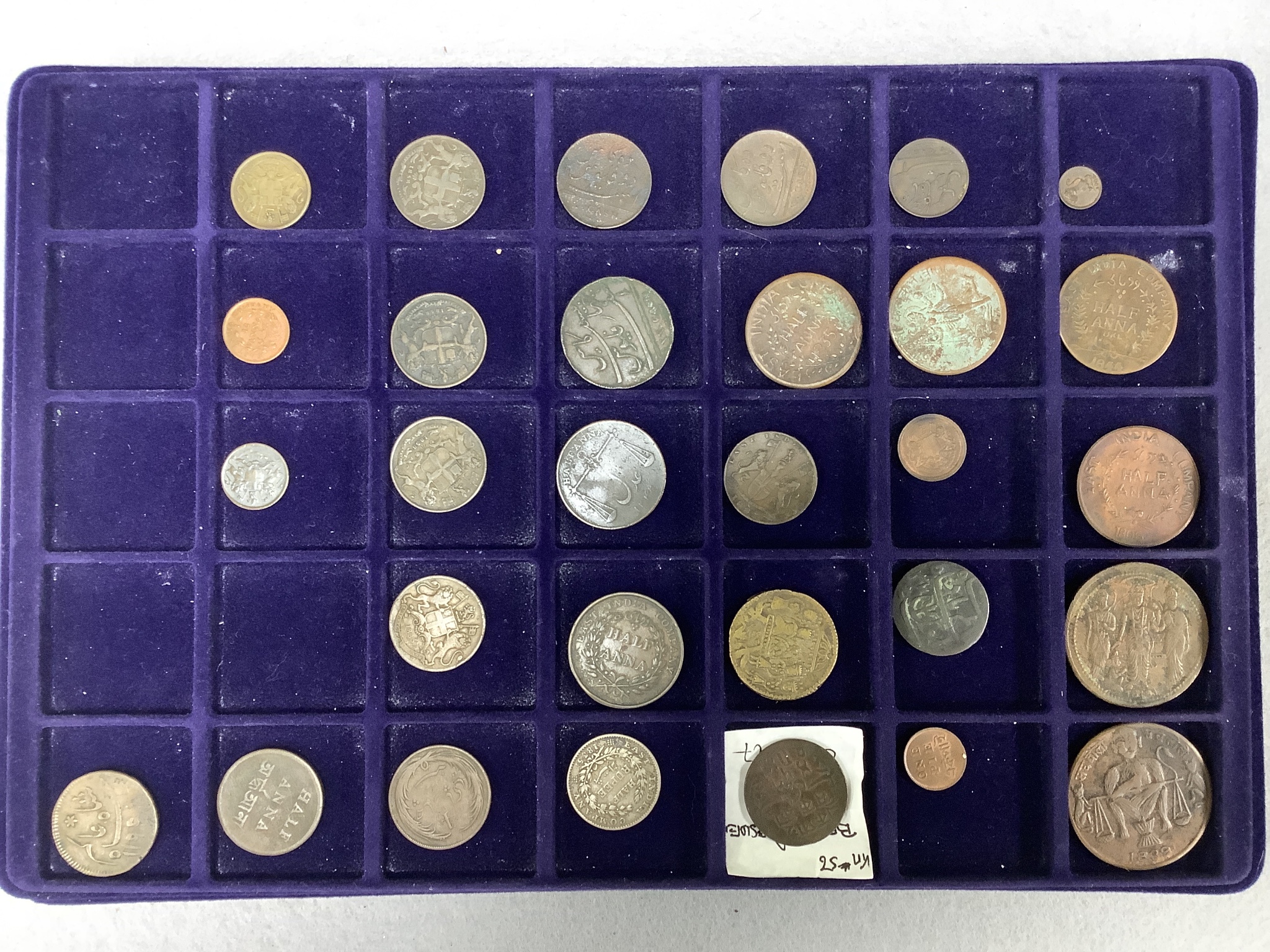 A collection of Indian coins mostly 16th-19th century, and UK silver crowns, half crowns and medals